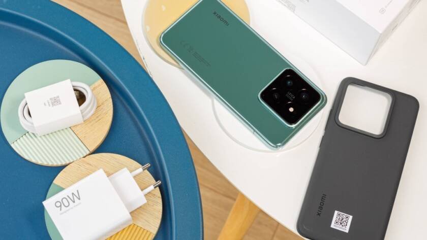 Green-colored Redmi Note 14 Series smartphones with a charger, highlighting the sleek design and fast charging capabilities of the Redmi Note 14 Series India Launch